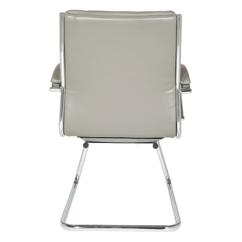 Fauteuil visiteur mi-dossier en similicuir avec accoudoirs rembourrés et piètement luge chromé