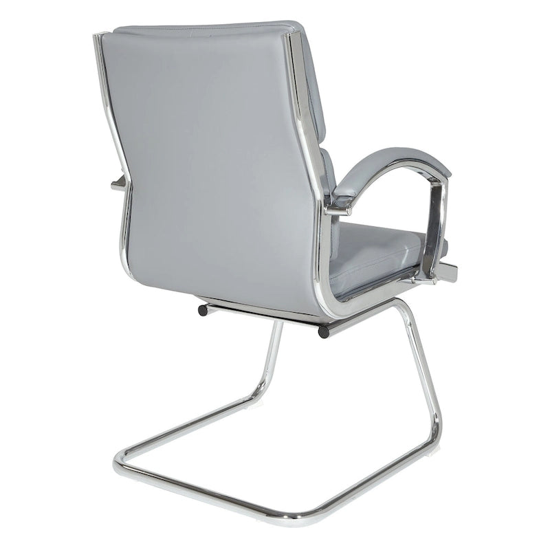 Fauteuil visiteur mi-dossier en similicuir avec accoudoirs rembourrés et piètement luge chromé