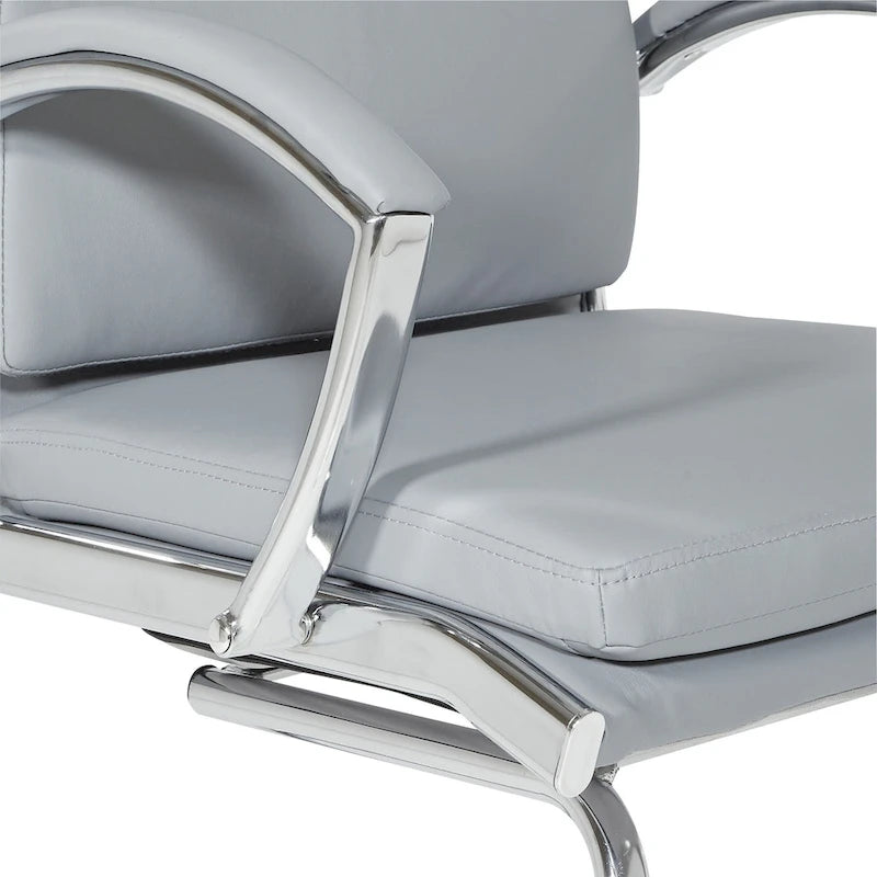 Fauteuil visiteur mi-dossier en similicuir avec accoudoirs rembourrés et piètement luge chromé