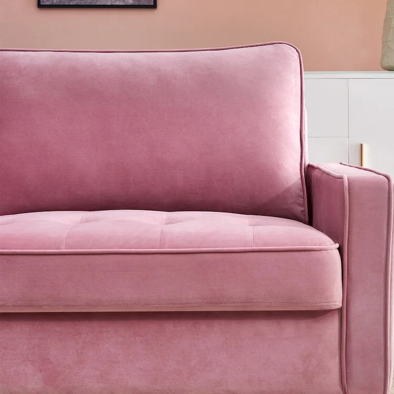 Canapé moderne en velours avec pieds en métal doré et coussins décoratifs