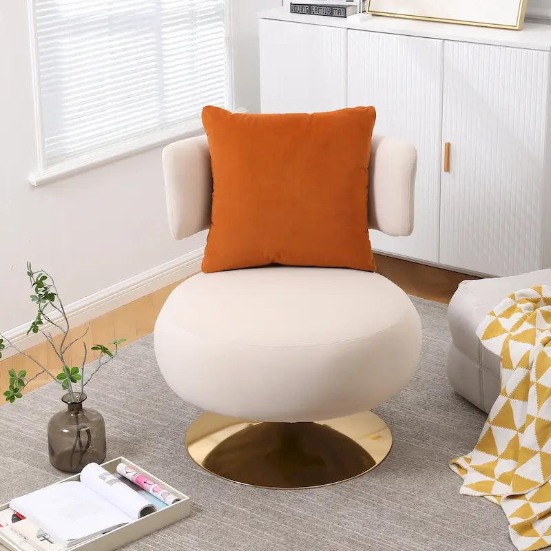 Fauteuil pivotant rembourré avec base en métal doré et dossier enveloppant