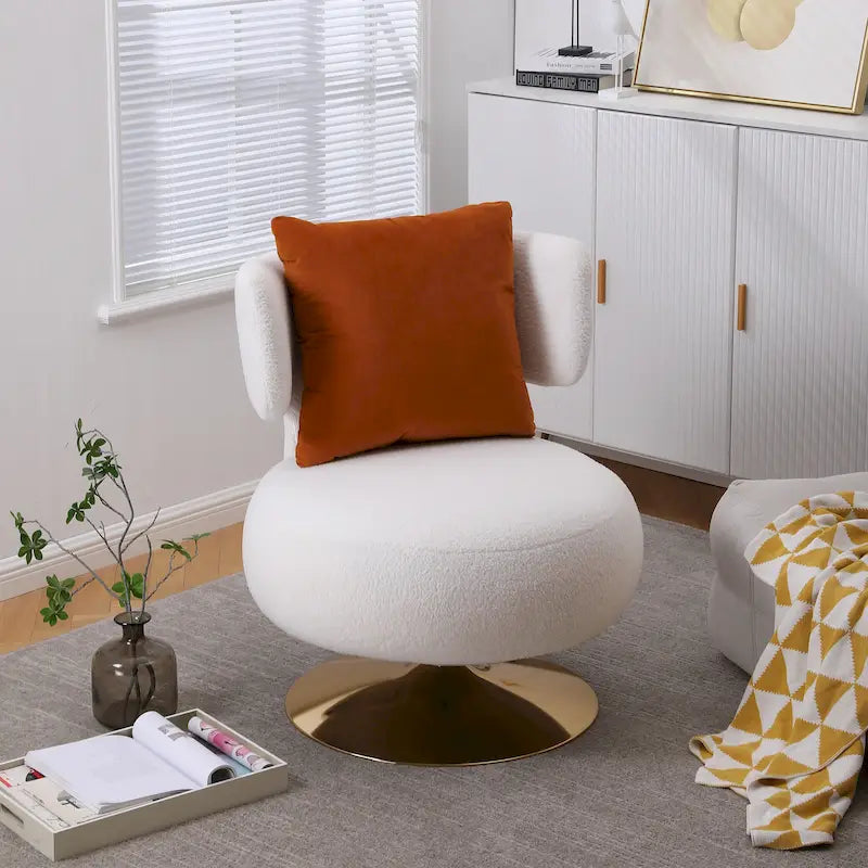 Fauteuil pivotant rembourré avec base en métal doré et dossier enveloppant