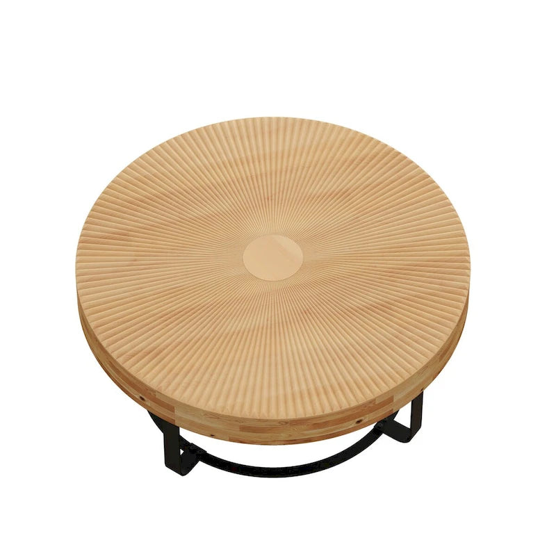 Table basse ronde en pin sculpté avec piètement en anneau en métal noir