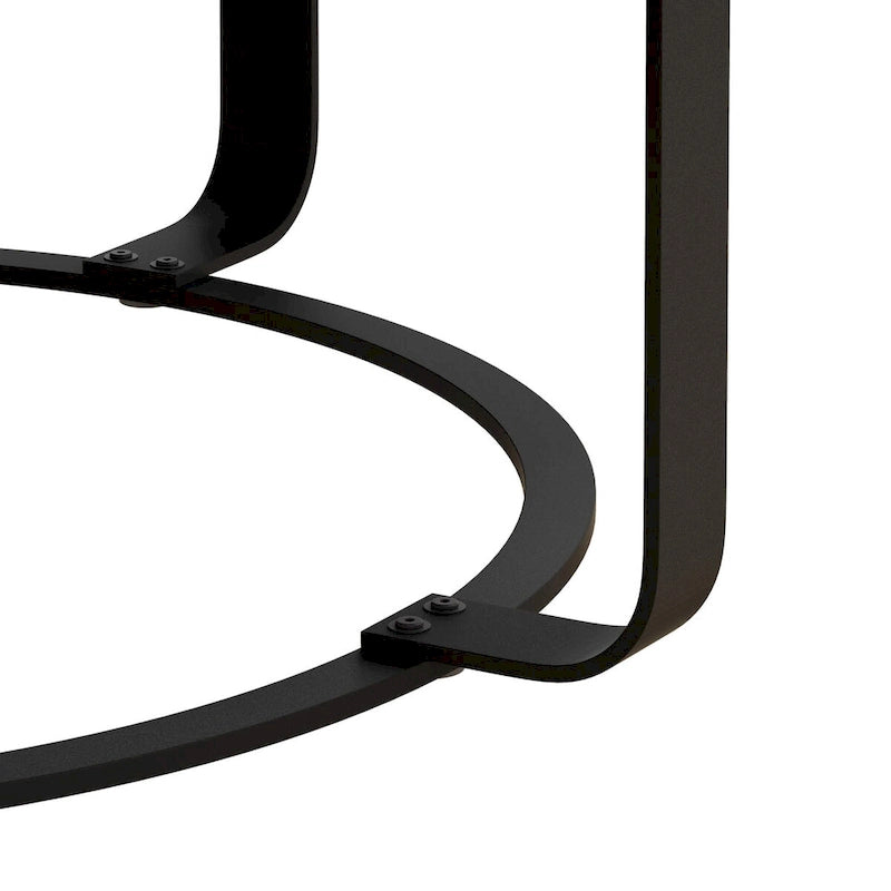 Table basse ronde en pin sculpté avec piètement en anneau en métal noir