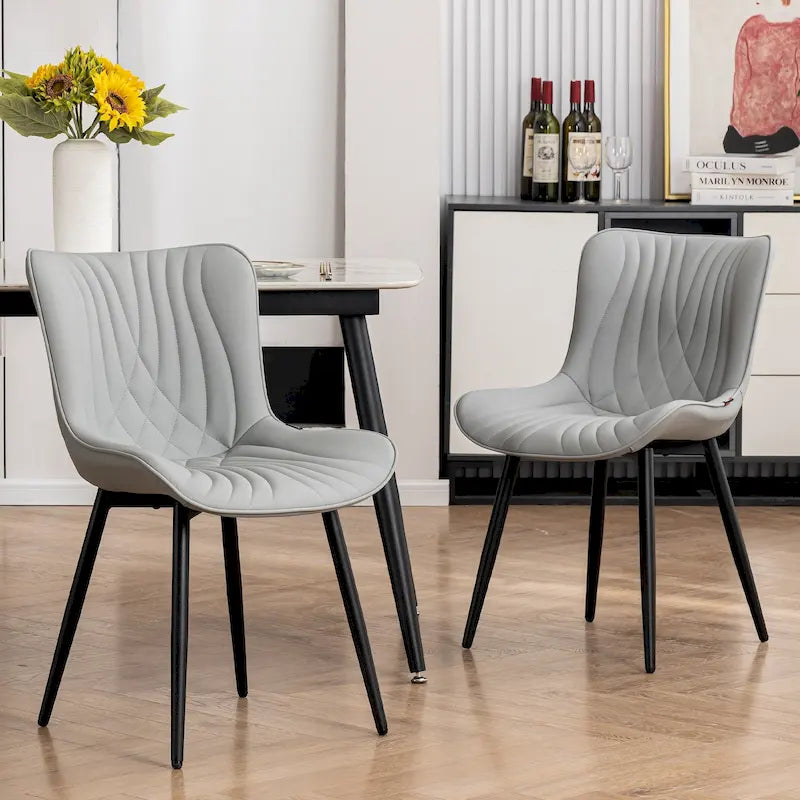Chaise de salle à manger sans accoudoirs en cuir rembourré avec pieds en métal, style moderne du milieu du siècle